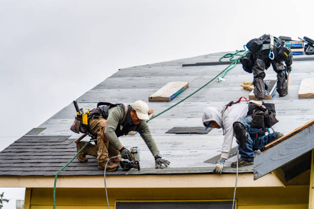 Professional Roofing technician working in Calera, OK
